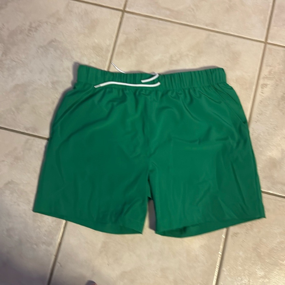 Men’s green swim trunks